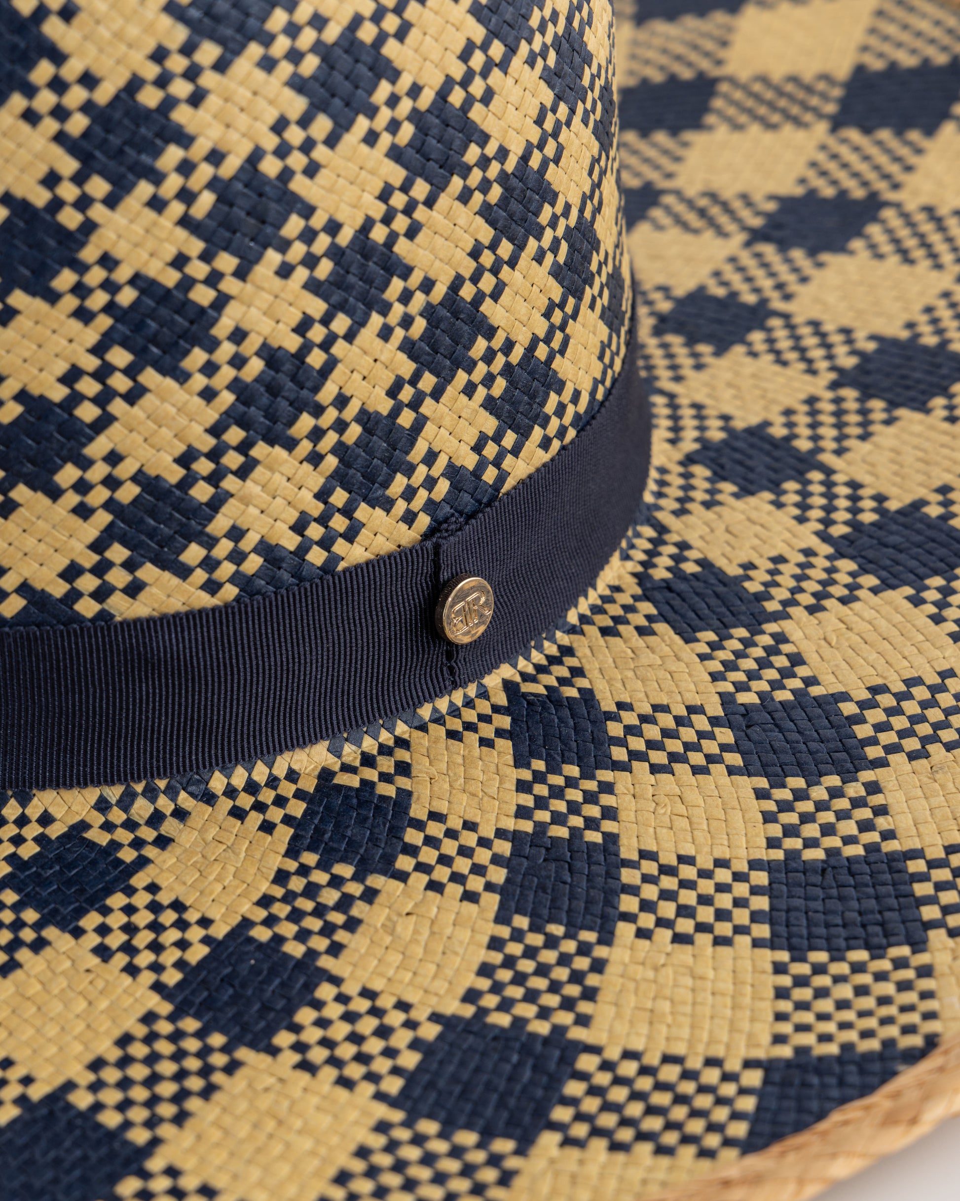 Born To Roam Rosewood Fedora Straw Hat with wide brim and woven texture, perfect for sun protection and stylish summer wear.