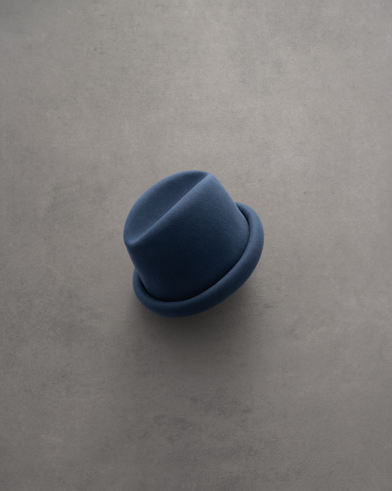 Navy Russian pillbox hat by Born To Roam featuring a sleek, structured design with a small brim and decorative band.