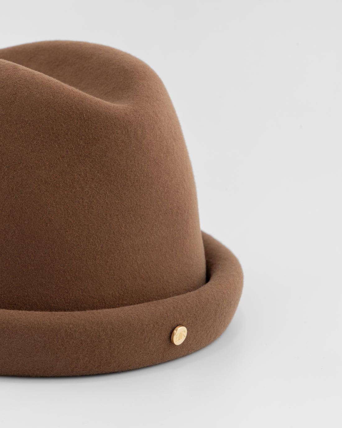Born To Roam Alpine pillbox hat in chocolate brown with a rounded crown and narrow brim, stylish and versatile for outdoor wear.