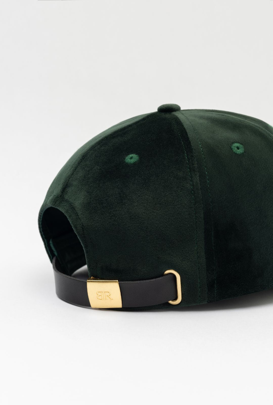 Dark green Queens Velvet Baseball Cap by Born To Roam showing the front view with a curved brim and embroidered logo.