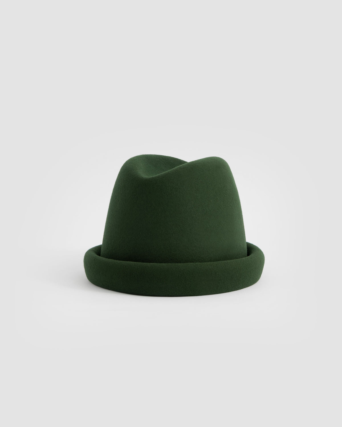Born To Roam Alpine Pillbox in hunter green with a sleek, compact design for storing pills or small items.