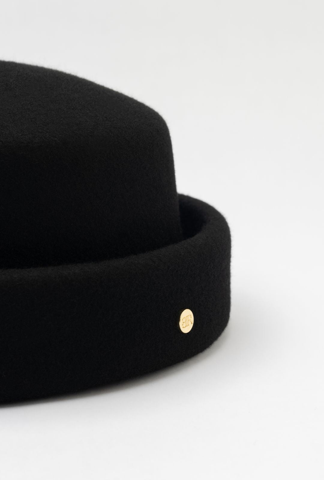 Born To Roam London Pillbox hat in black, stylish final sale hat with a classic round shape and sleek design.