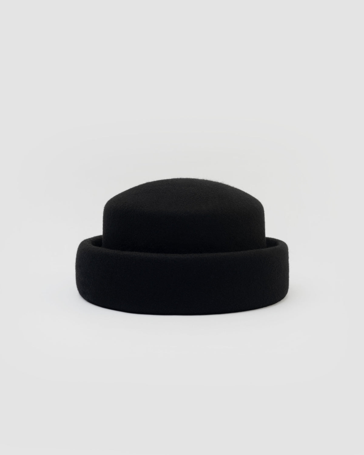 Born To Roam London Pillbox hat in black, stylish final sale hat with a classic round shape and sleek design.