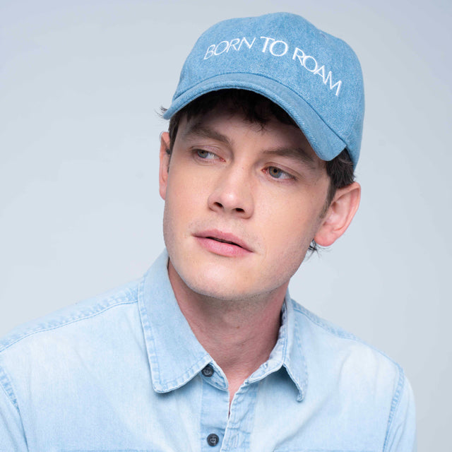 Born To Roam Queens Baseball Cap in classic denim, featuring a structured fit and embroidered logo on the front.