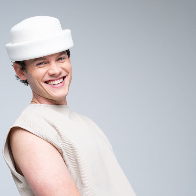 Ivory London Pillbox hat by Born To Roam featuring a classic, structured design perfect for elegant styles.