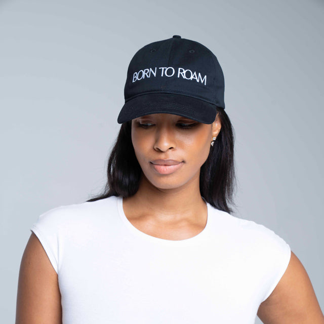 Black Queens Baseball Cap by Born To Roam showing the front view with a curved brim and embroidered logo.