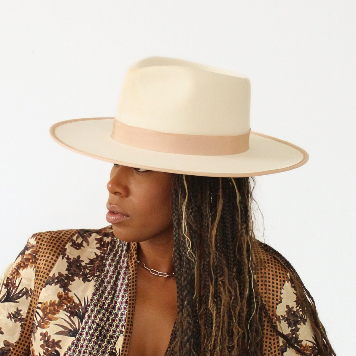 Born To Roam Kenya Fedora hat in bone color, stylish wide-brim hat made of lightweight material for sun protection and fashion.