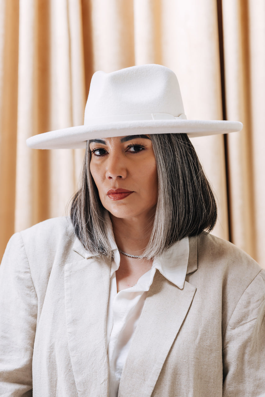 Unisex ivory fedora hat from Born To Roam's Galilee Rancher collection, featuring a stylish wide brim and classic design.