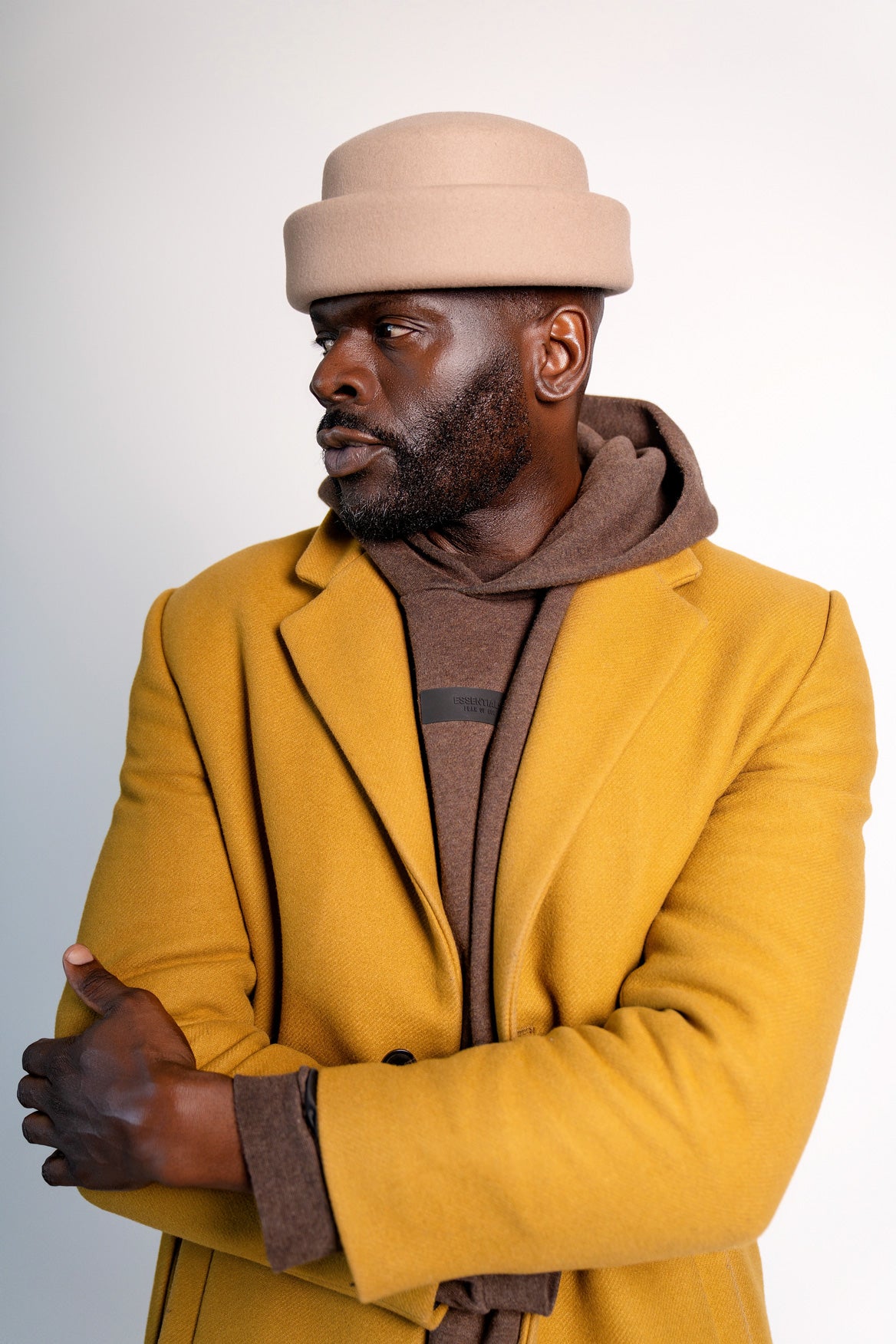 Born To Roam London Pillbox Hat in nude, stylish women's hat with a sleek, structured design and elegant finish.