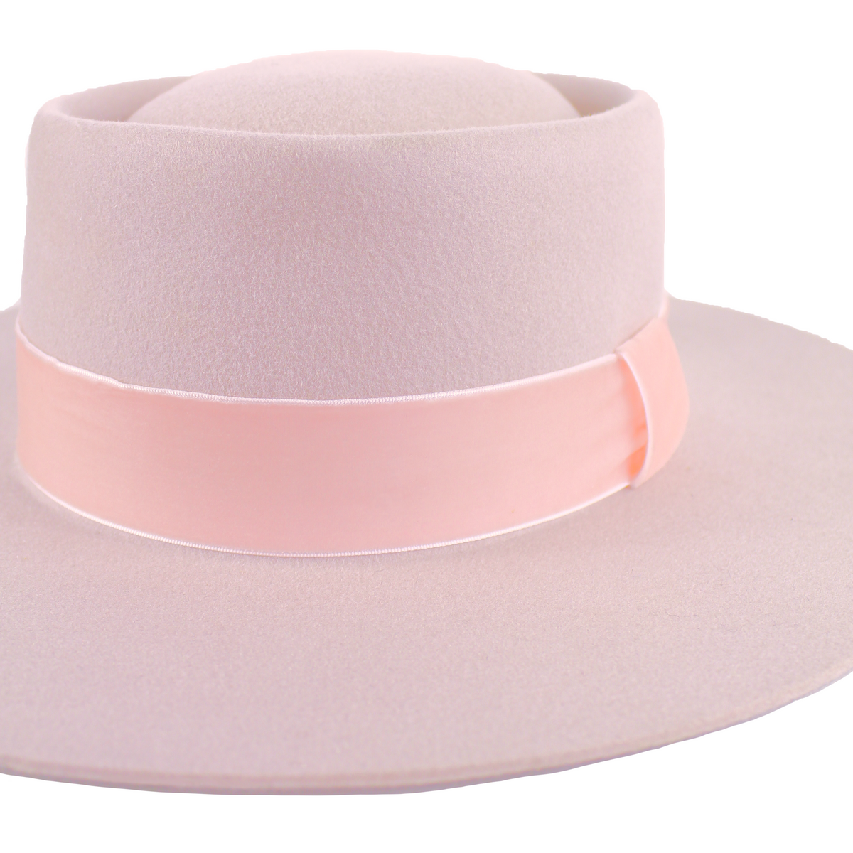 Born To Roam Kayo boater hat in blush pink, featuring a wide brim and stylish design perfect for sun protection and fashion.