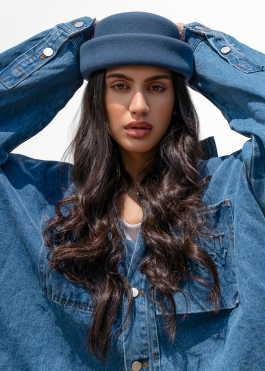 Born To Roam navy London pillbox hat made of denim, featuring a classic, structured design perfect for stylish accessories.