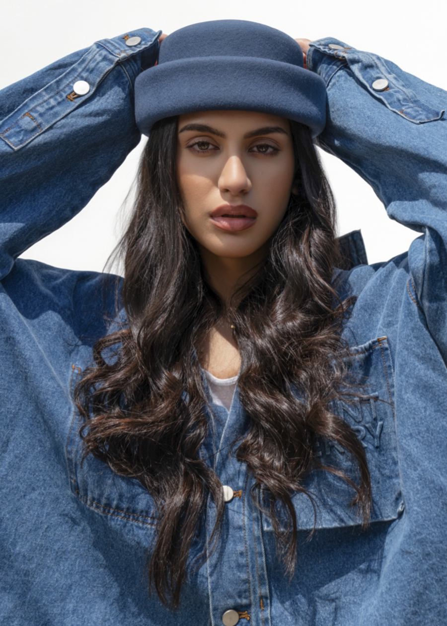 Born To Roam navy London pillbox hat made of denim, featuring a classic, structured design perfect for stylish accessories.