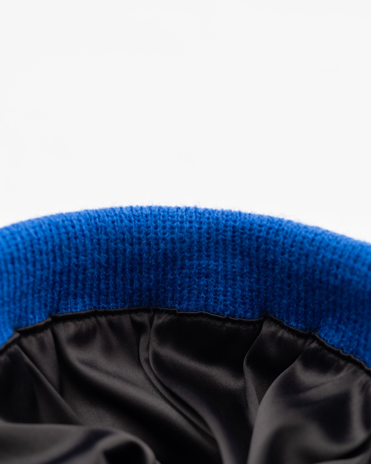 Cobalt blue Vail Knit Beanie by Born To Roam featuring a cozy, ribbed knit design and fold-over brim.