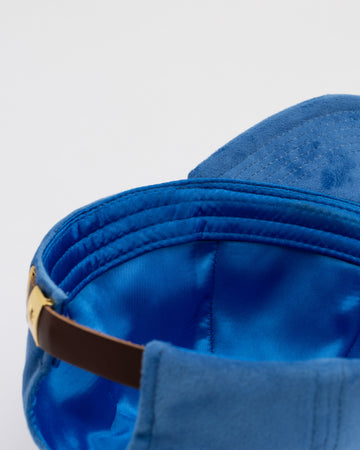 Blue Bronx Velvet Baseball Cap by Born To Roam with a curved brim and adjustable strap, showcasing a stylish casual accessory.
