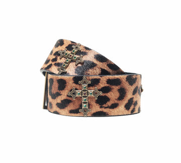 Leopard print calf hair belt from WeAreBornToRoam featuring a sleek buckle and textured animal pattern.