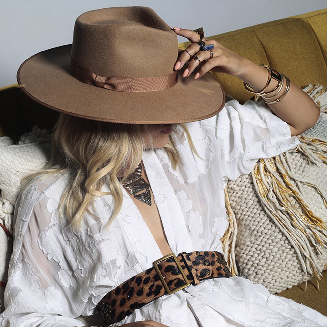 Leopard print Roma calf hair belt by WeAreBornToRoam featuring a stylish and textured design on a natural leather strap.