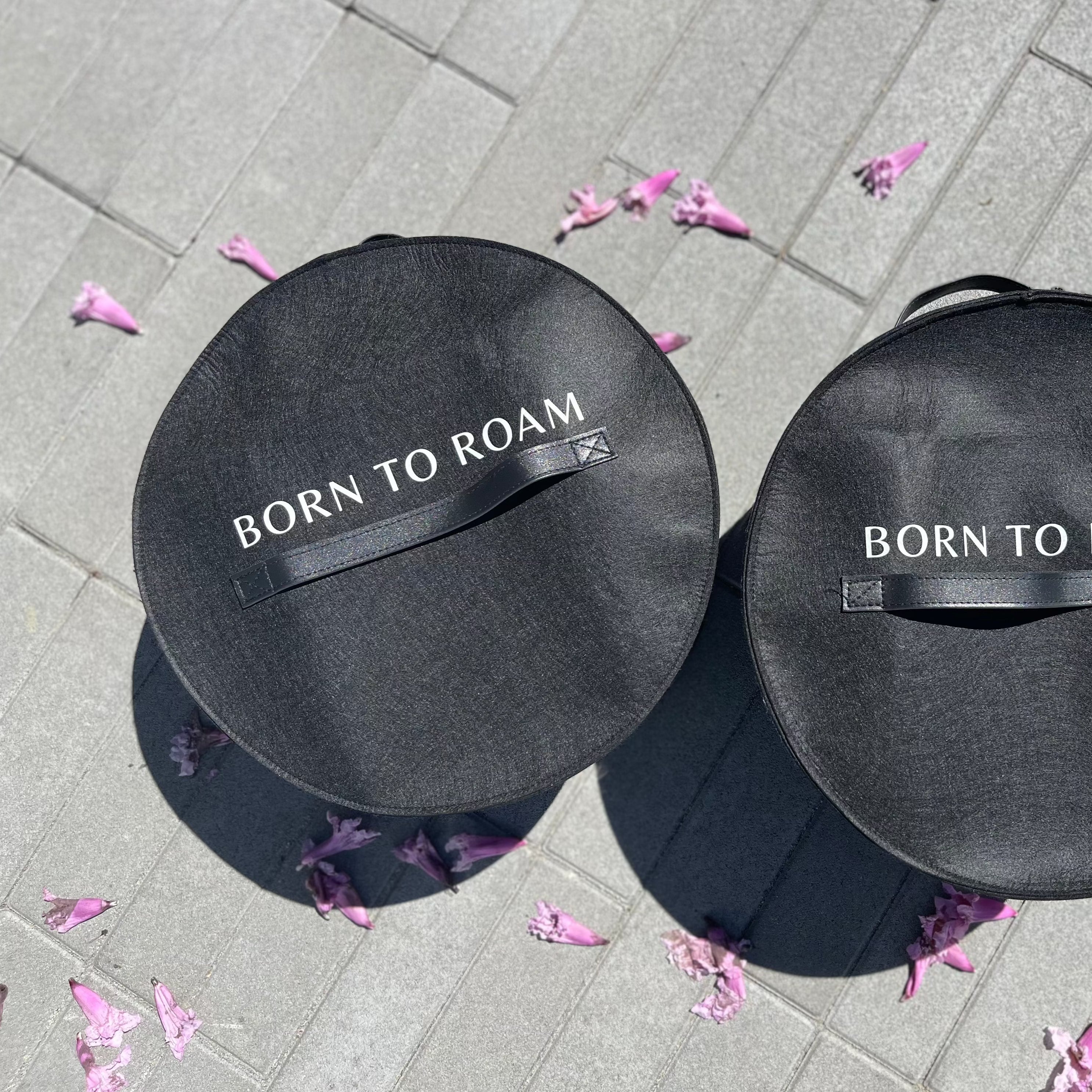 Carry your wanderlust with Born to Roam hat luggage
