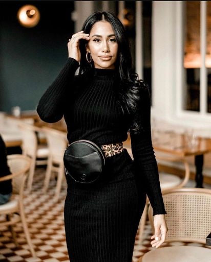 Leopard print Roma calf hair belt by WeAreBornToRoam featuring a sleek leather strap and stylish gold buckle.