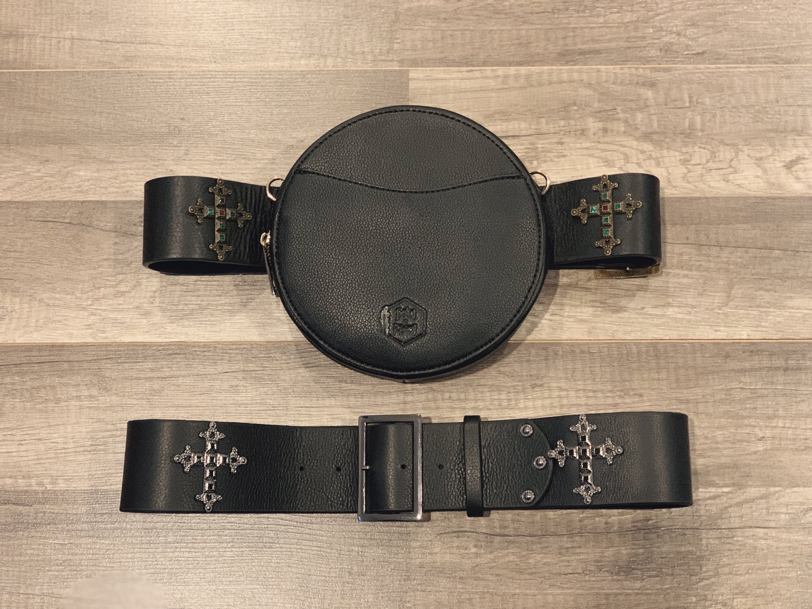 Stylish black leather pouch for crossbody wear