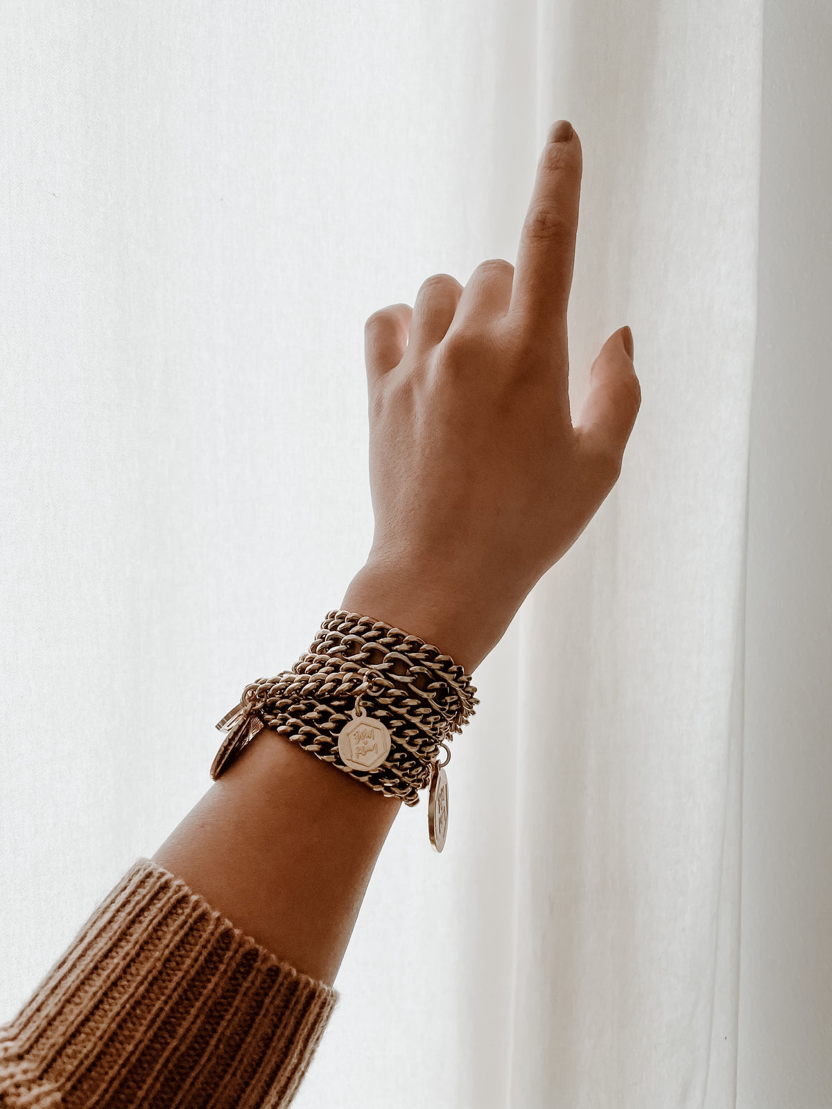 Born To Roam Treasured Chain Belt necklace featuring a delicate chain design, worn as a stylish waist accessory.