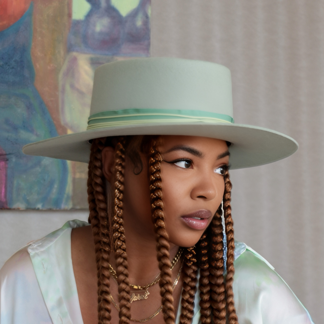 kayo boater hat in mint green on woman