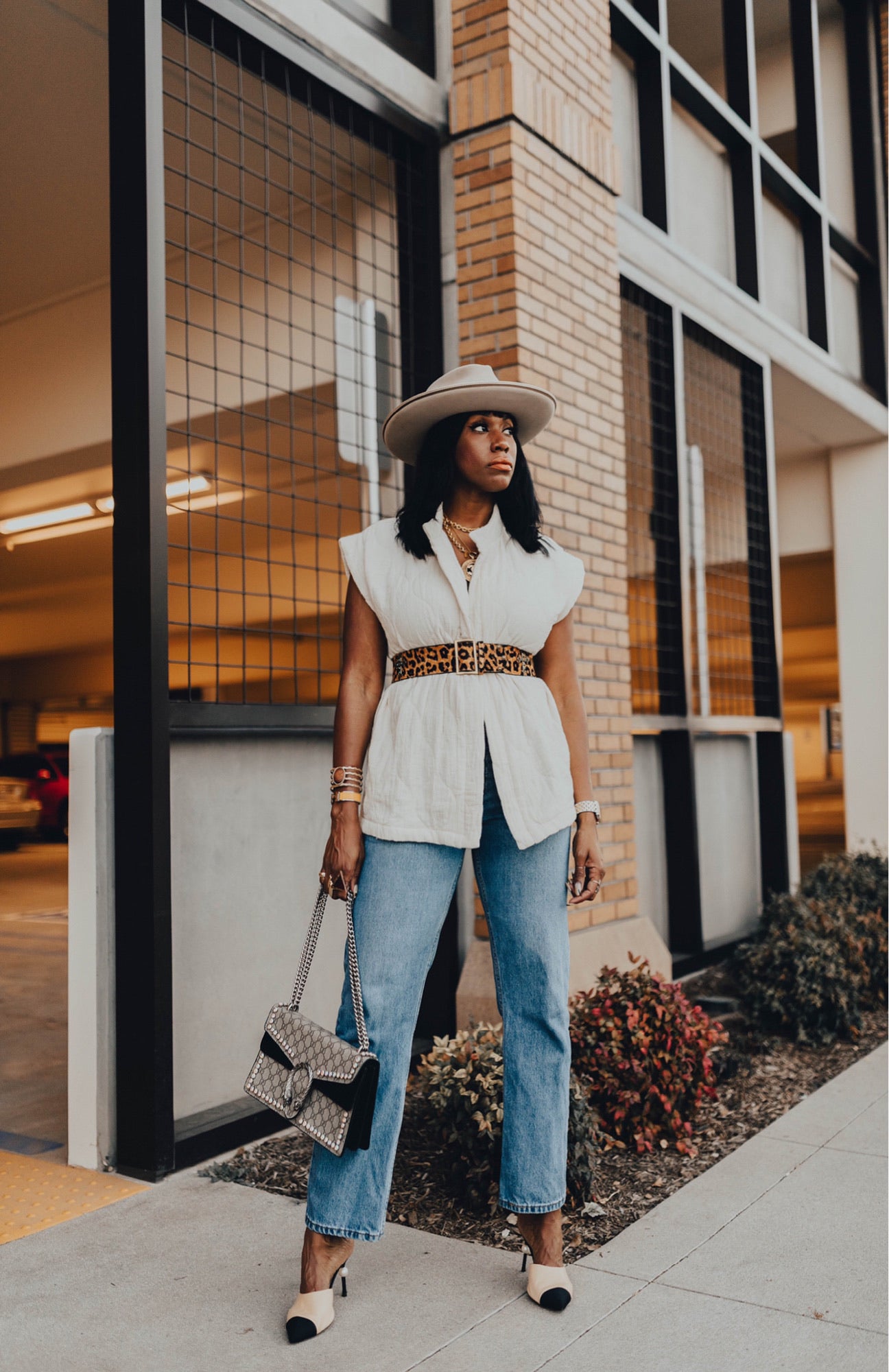 Leopard print Roma calf hair belt by WeAreBornToRoam featuring a stylish design and adjustable buckle.