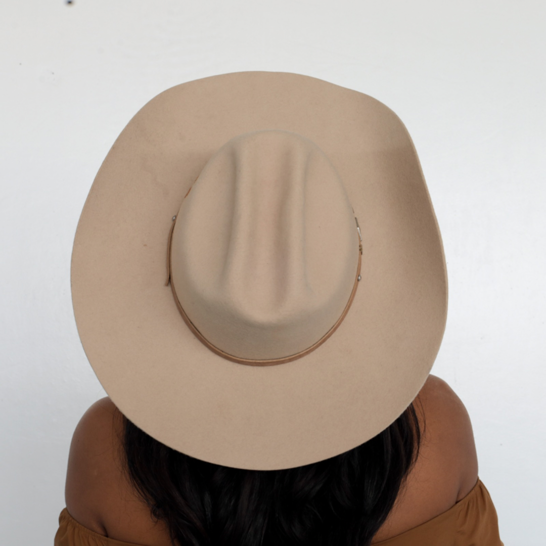 BornToRoam - women posing wearing Upland Cattleman Cowboy Hat in Tan upper view